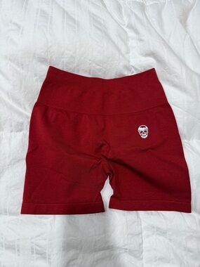 High-Rise Red Athletic Bike Shorts with Skull Accent